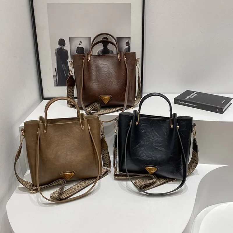 

Стильные роскошные сумки для подгузников: Женская кожаная сумка через плечо большой вместимости, минималистичная винтажная элегантная модная сумка-тоут