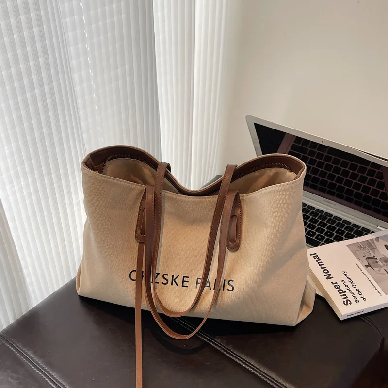 2025 حقيبة عصرية تحت الإبط لها قماش سعة كبيرة محفظة حمل حقيبة كتف كروسبودي عادية ركاب موضة علامة الحروف ​ ​