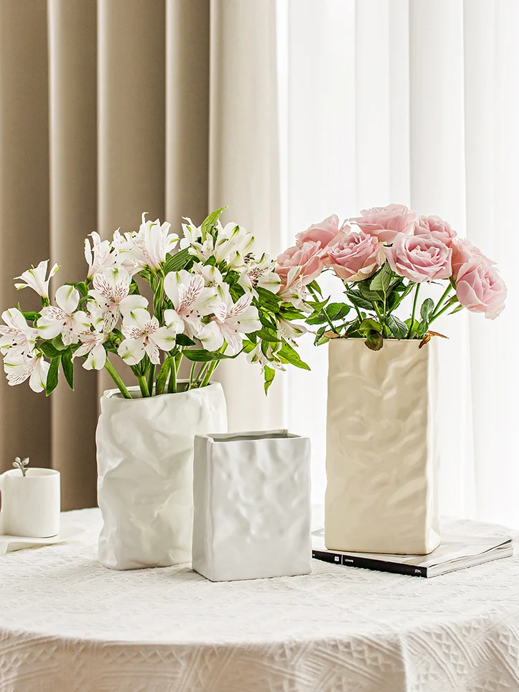 

Vase ornament Living room flower arrangement ceramic high-end sense white hydroponic rose simple paper bag cream fold niche