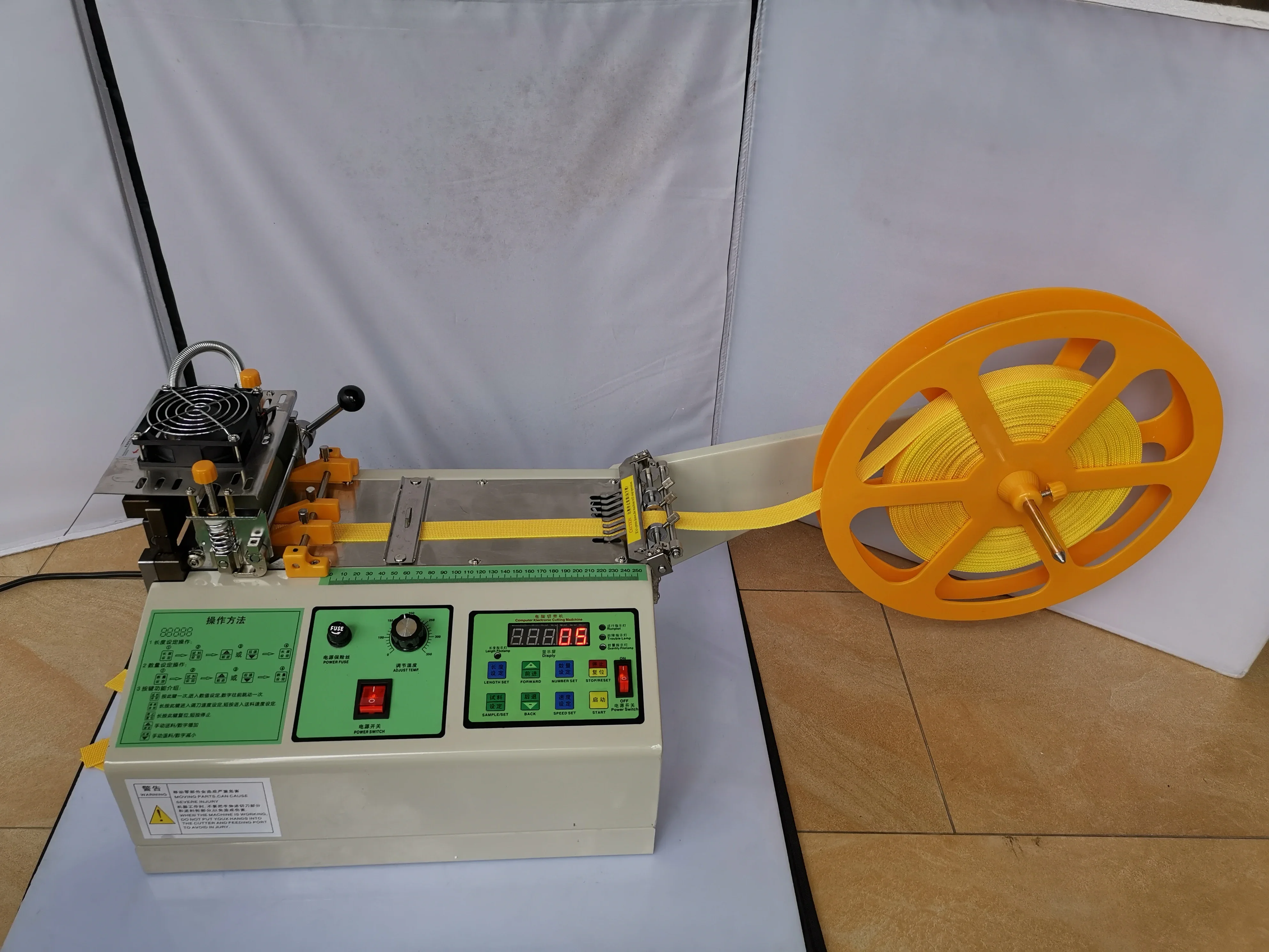 988C Computer automatic Cloth belt cutting machine Cold and hot blades magic adhesive tape zipper webbing elastic belt cutter