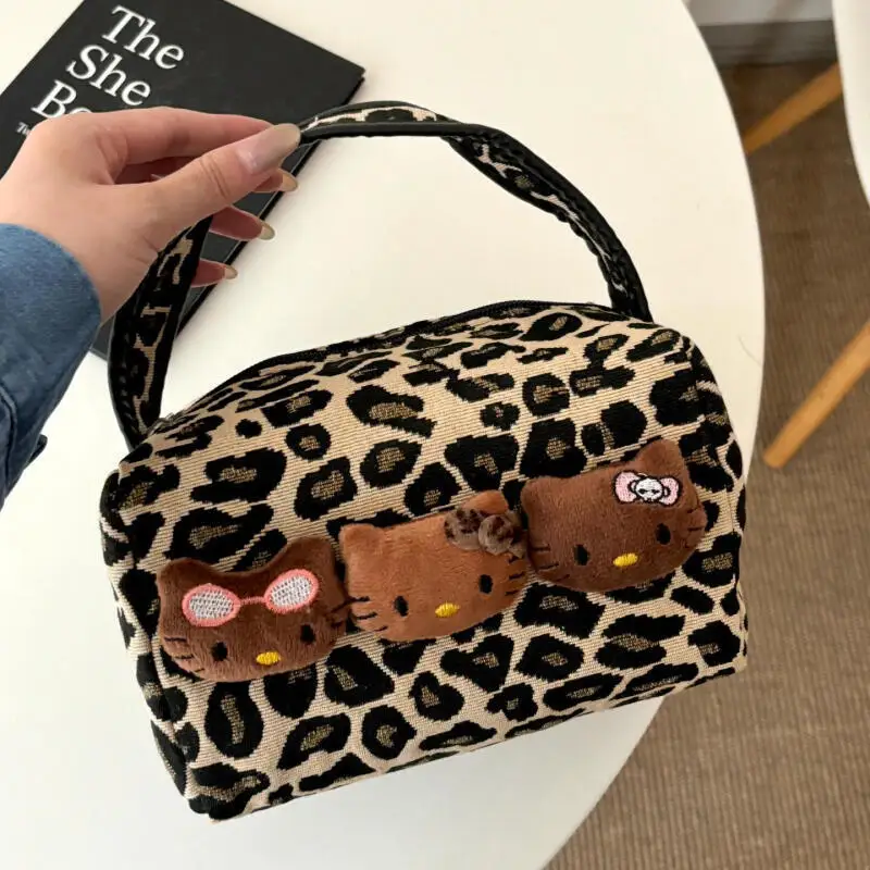 Miniso Hellokitty trousse de maquillage Kawaii motif léopard sac de rangement à main en cuir noir Kt trousse de rangement de toilette sac à main