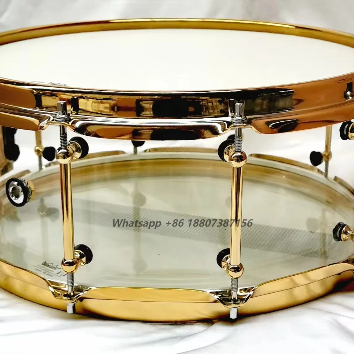 

14x6.5 Clear Snare Drum with Golden Hardware