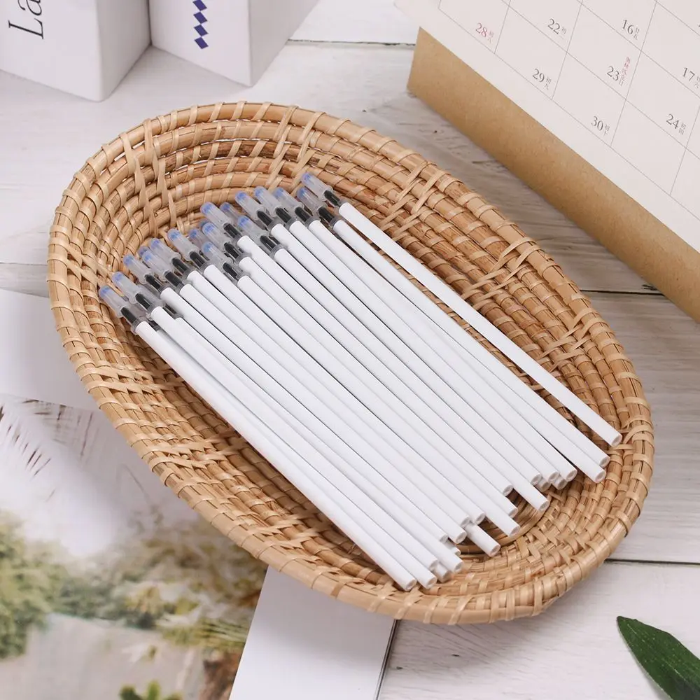 

10PCS/Lot School Signature Writing Supplies Medium Nib Core White Color Shell Gel Pen Refills Black Ink