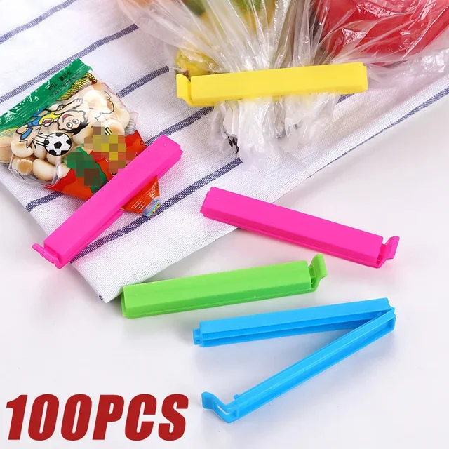 50/100 szt. Torba na żywność klipsy torba na żywność zacisków uszczelniających wielokolorowe plastikowe klipsy wielokrotnego użytku do przechowywanie żywności paczek worki do zamrażarki