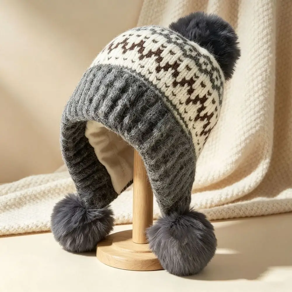 Polyester Material Ear Flap Knitted Hat Ear Protection Face Slimming Design Thick Warm Beanie 52-58CM with Pom Poms
