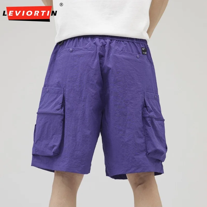 กางเกงขาสั้นคาร์โก้ลำลองสำหรับผู้ชายสไตล์อเมริกันกางเกงขาสั้นทรงหลวมบางสีพื้นแฟชั่นฤดูร้อน