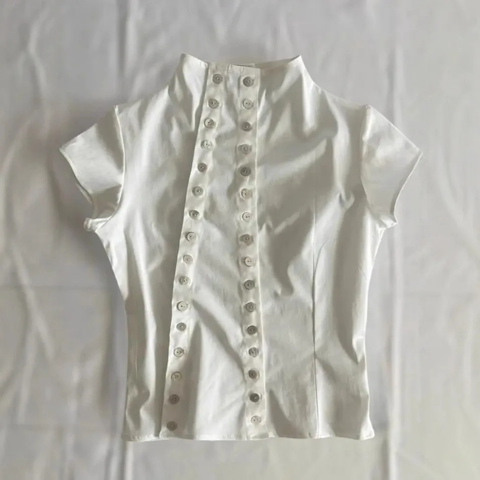 Spring/Summer 2026 New Napoleon Retro Double-breasted Button Design Women's T-shirt Solid color simple short slim and sexy.