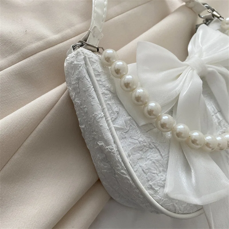 Fashionable and portable bow single shoulder pearl bag with 1 detachable pearl strap