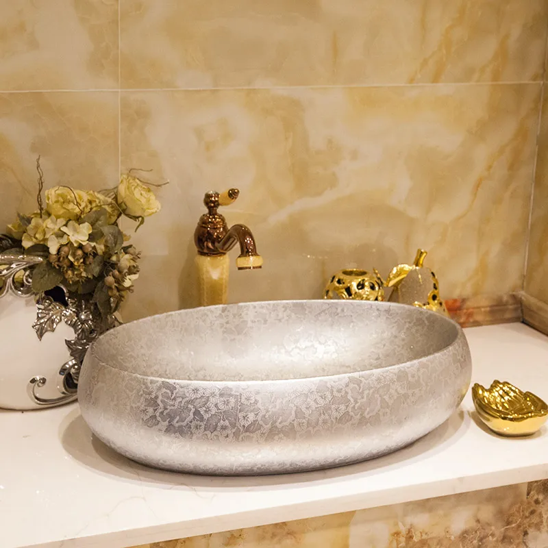 

European oval Gold and silver Chinese wash basin Jingdezhen art platform top ceramic bathroom wash basin Chinese ceramic sink