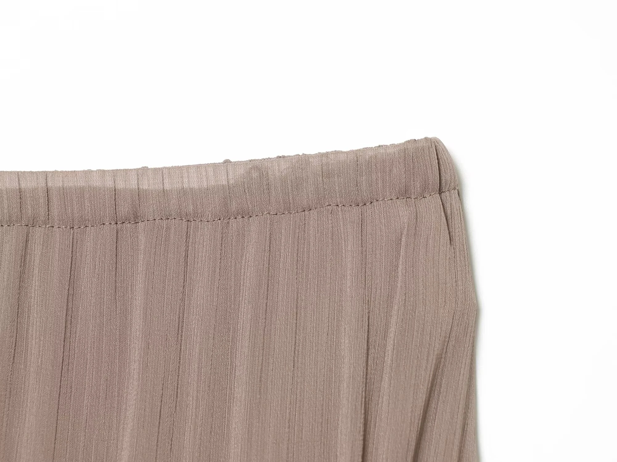 Europäischer und amerikanischer Stil 2026 Sommer Neue Damenmode Mittelhoher Bund Mehrschichtige Dekoration Asymmetrischer Kurzer Rock Halbrock – Detail 8