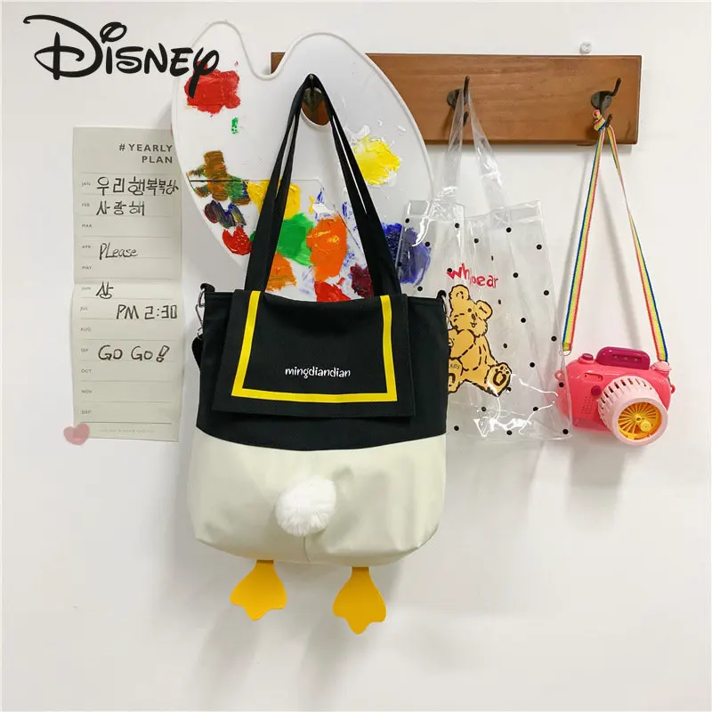 Disney-Bolso cruzado de dibujos animados de pato Donald para niños, bolso de compras de ocio versátil de alta calidad, a la moda, para mujer