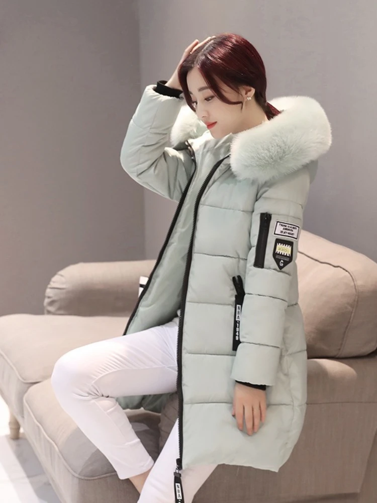 موضة سستة جيوب تصميم حجم كبير سترة المرأة الشتاء طوق مقنعين سترة الملابس أنيقة ضئيلة الدافئة سميكة معطف الإناث