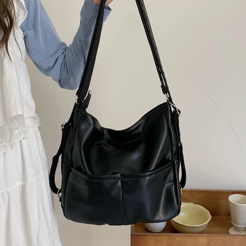 กระเป๋าเป้สะพายหลังสีเรียบสไตล์เรโทรสำหรับผู้หญิง หนังนิ่ม ความจุเยอะ ดีไซน์เรียบง่าย กระเป๋าสะพายไหล่ผู้หญิงอเนกประสงค์ ใช้ได้หลากหลายโอกาส