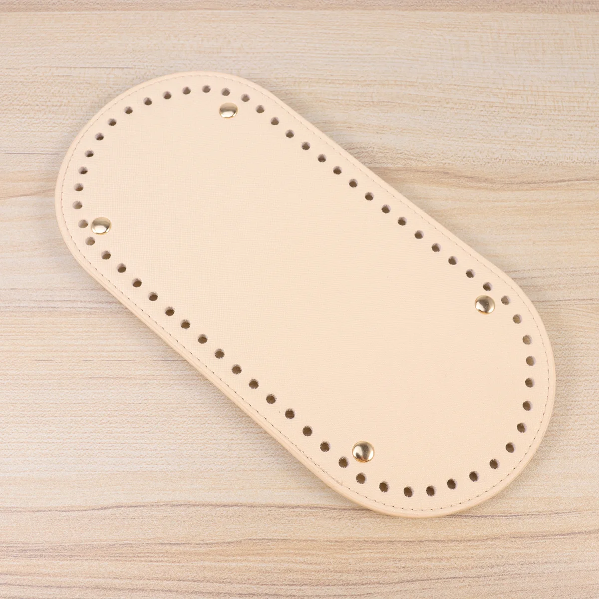 แผ่นรองฐานกระเป๋าทรงรีทำจาก PU สีแอปริคอต สำหรับงาน DIY ทนทาน มีรูและตะปู 4 ตัว อุปกรณ์ตกแต่งกระเป๋าสุดหรู