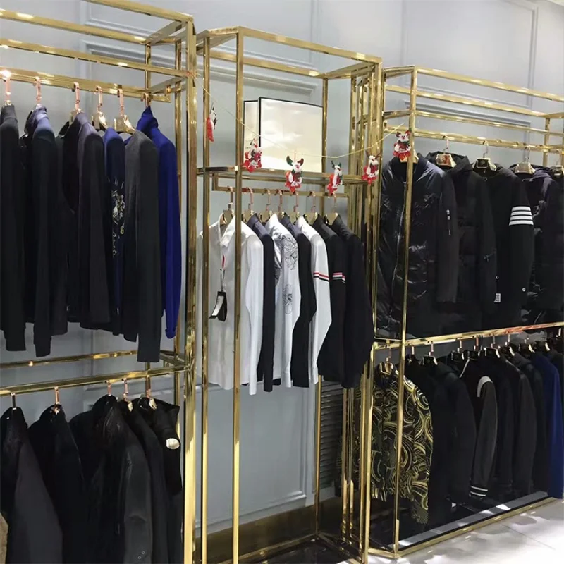 CustomGold Stainless Steel Landing Medium Island Shelf Factory Price Display Stand For Clothing Shop Dress Display Rack