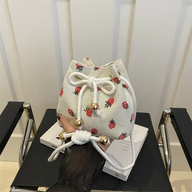 

Stylish niche design striped bucket bag casual versatile strawberry printed messenger backpack