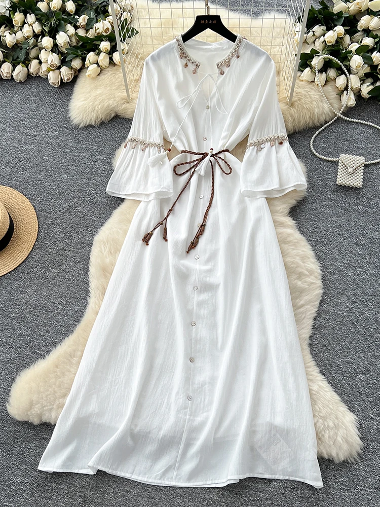 

2025 Summer Vacation Style Lace Up Waist Dress Women's White Ethnic Style Short Sleeved Single Breasted Tassel Long Dress D40
