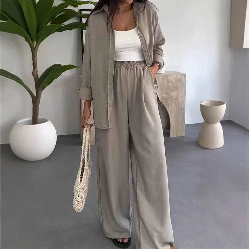 

Невобычный цветной свободный комплект из топа и брюк, повседневные широкие брюки, комплект из двух предметов, длинный воротник све, женский комплект на пуговицах...