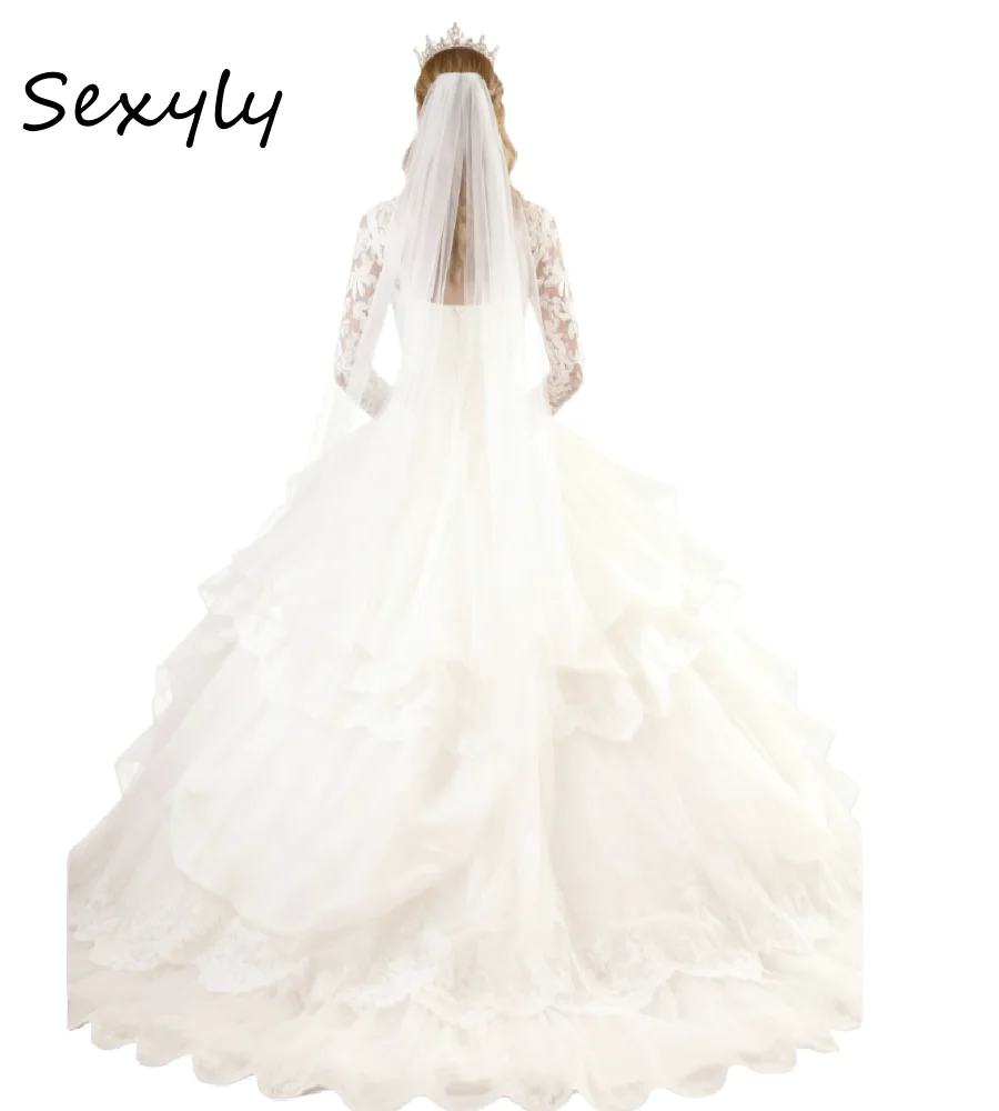 ชุดแต่งงานเจ้าหญิงสไตล์เกาหลีแบบกัตสบี้ ผ้าลูกไม้ แขนยาว ทรงบอลกาวน์ คอสูง ชุดเจ้าสาวราชินี ปี 2026 สไตล์โบโฮอีเทอร์เรียล สง่างาม