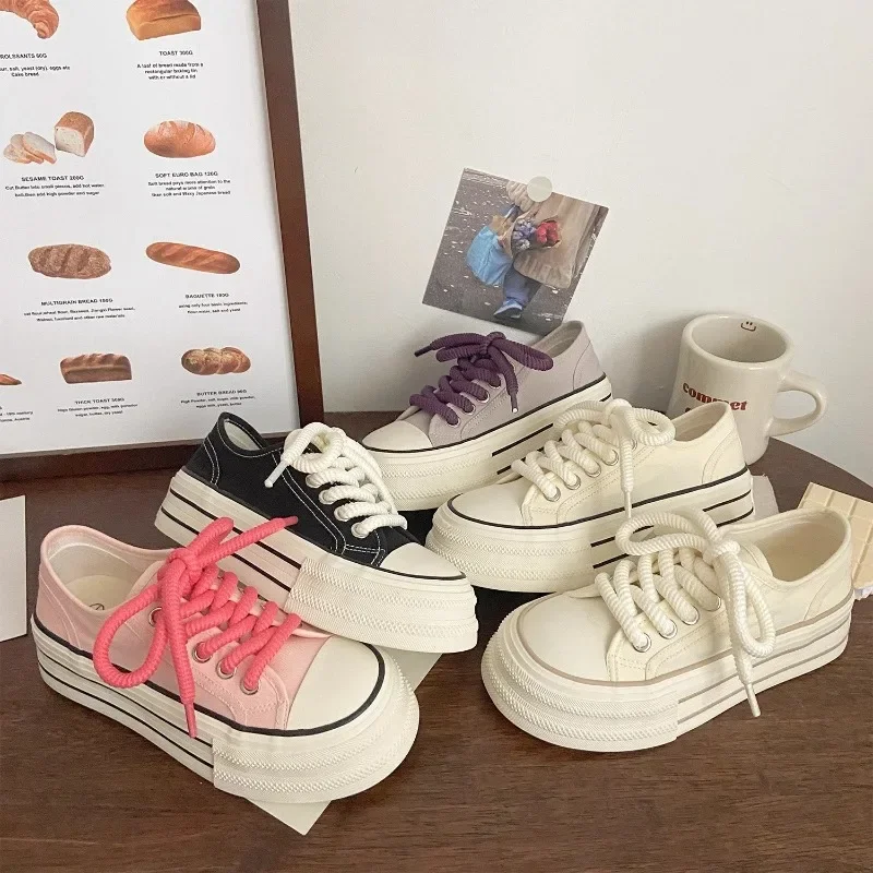 Cream colored canvas shoes for women. Thin spring, summer, and autumn styles. New trend Korean casual canvas shoes for women