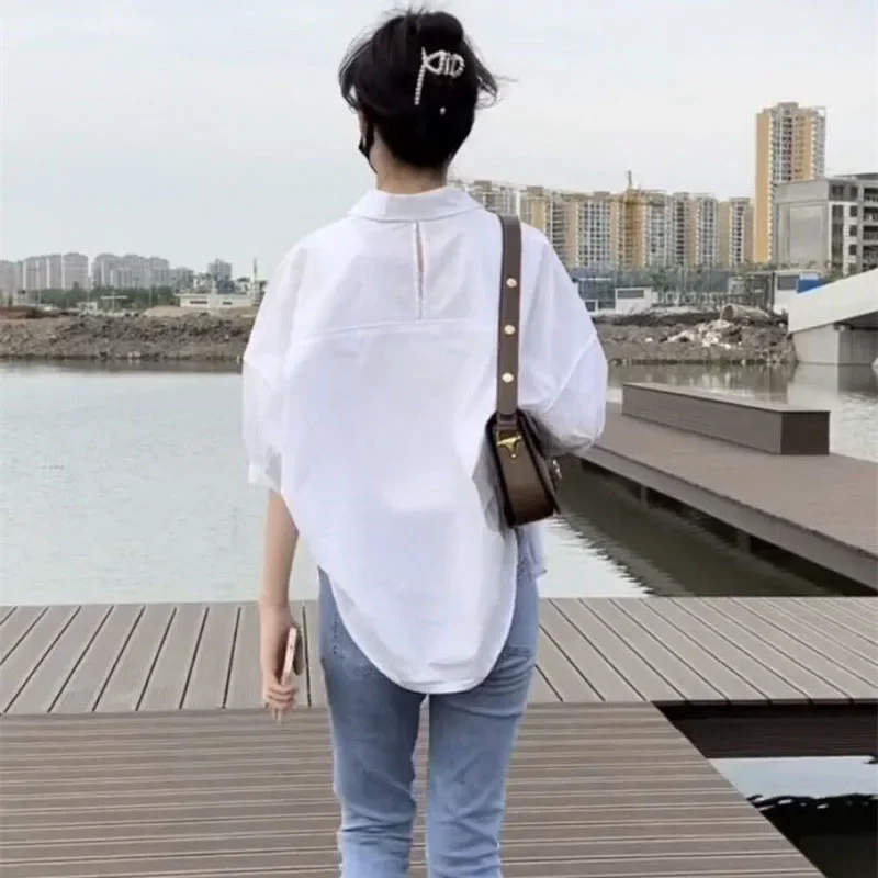 Xpqbb-女性用半袖ボタンアップブラウス,ルーズフィットの不規則なシャツ,カジュアルなトップス,すべてにマッチするターンダウンカラー,新しいファッション,2024