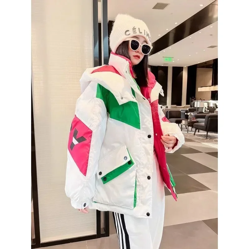 Piumino di alta qualità da donna nuovo inverno colore esplosivo splicing piccolo cappotto lungo caldo spesso marea moda abbigliamento popolare