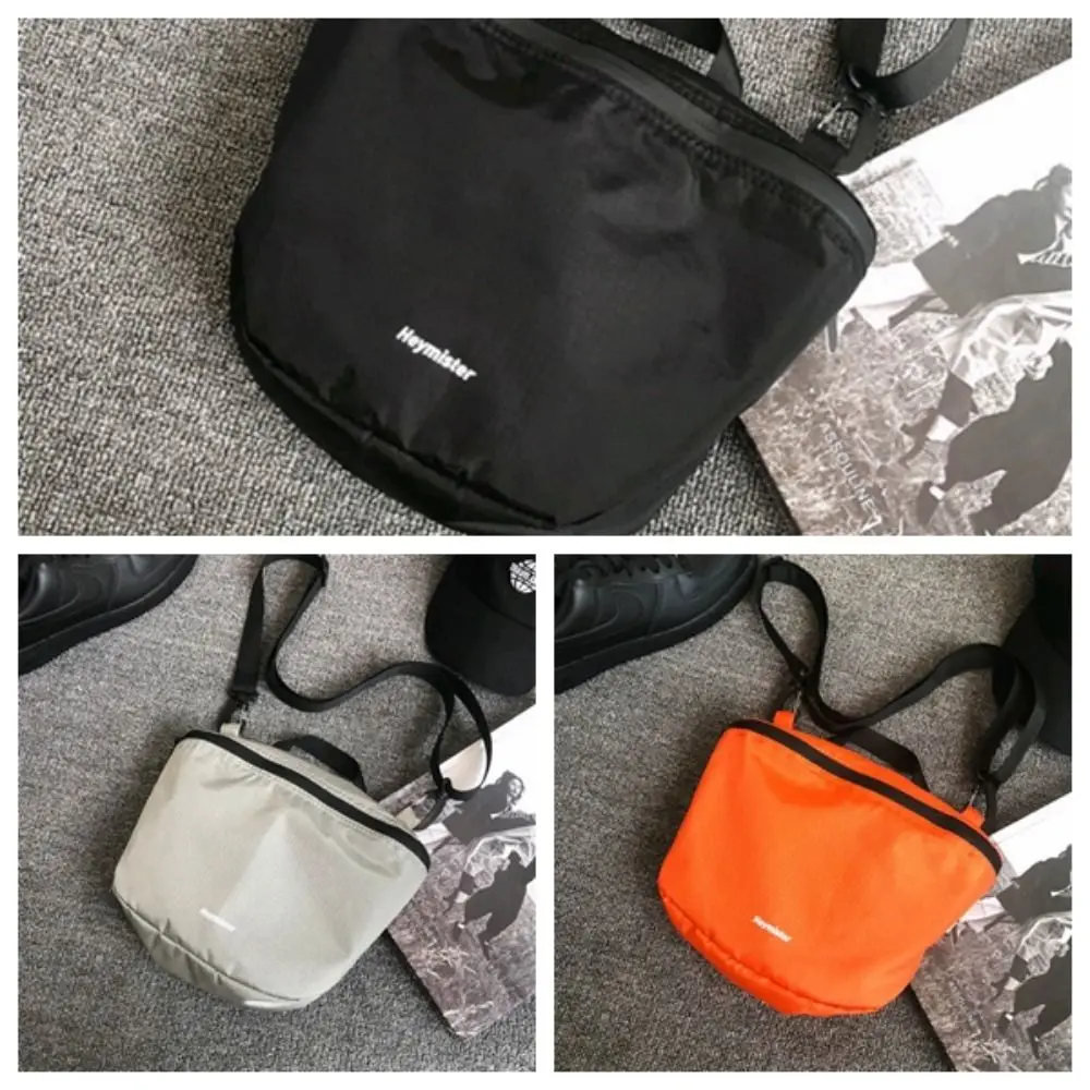 Bolso de hombro cruzado de moda coreana para mujer, bolso informal de Color sólido, bolso de mensajero Unisex de tela de nailon impermeable,