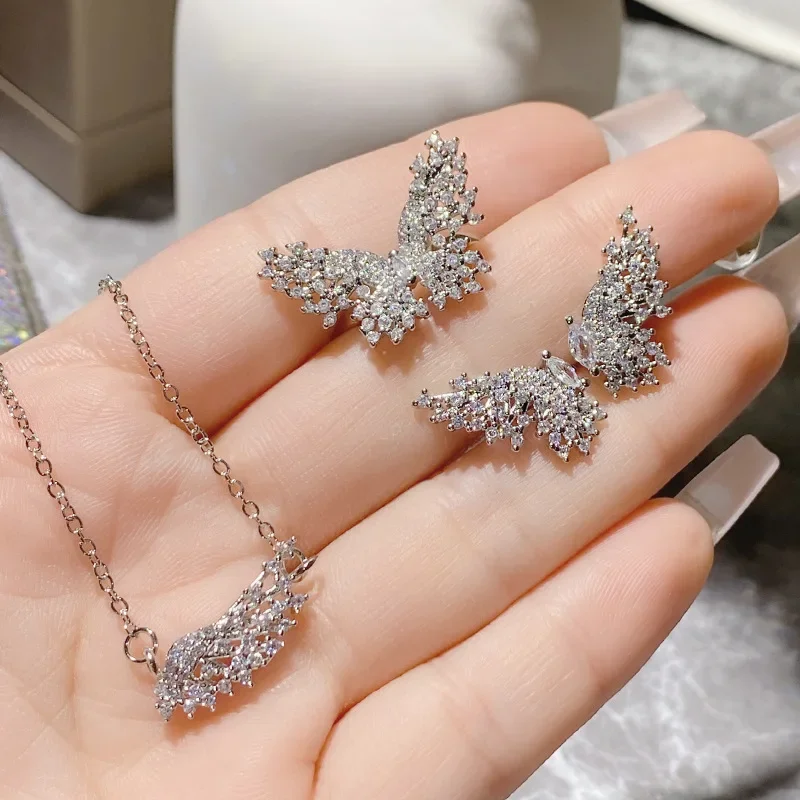 

MDL Moissanite style Niche Earrings Set Gold-Plated Multi-Cut Teardrop Zirconia Butterfly Ring Full Diamond Necklace