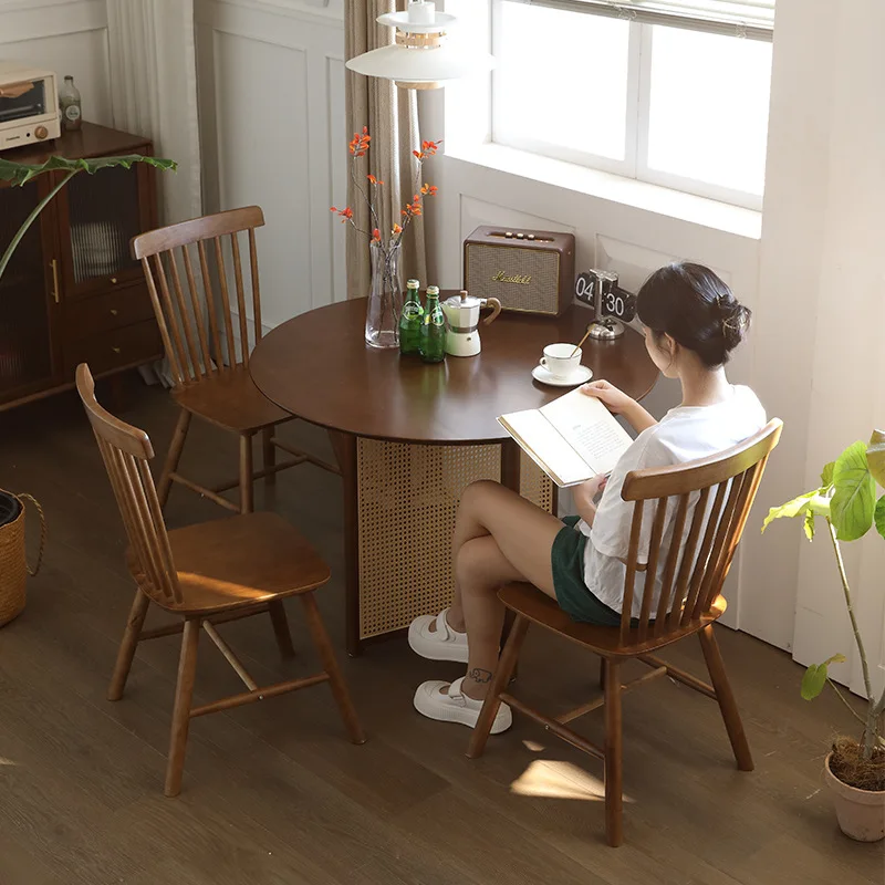 Character rattan foot round dining table black walnut solid wood round dining table small apartment household Chinese