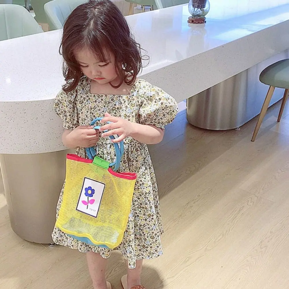 اللون الاصطدام شبكة حمل حقيبة شفافة قذيفة حقيبة التخزين الأطفال حقيبة يد الجوف خارج الأم الاطفال حقيبة شبكة حقيبة شاطئية السفر