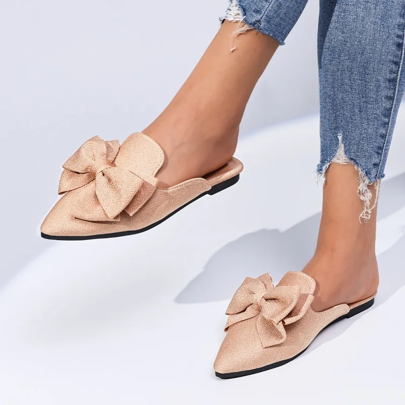 شباشب نسائية عصرية مدببة مع تصميم زخرفة فيونكة ضحلة شبه مقاومة للانزلاق أحذية نسائية فاخرة مسطحة القاع