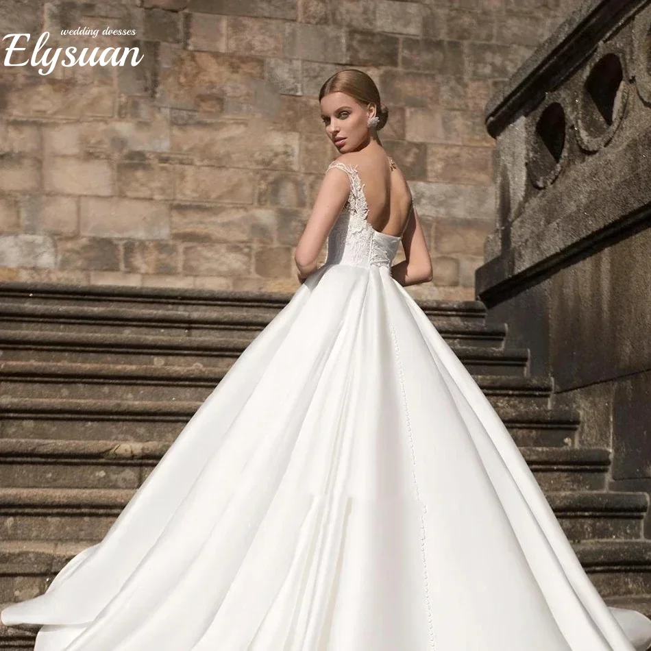 ชุดแต่งงานแบบเปิดไหล่ทรงเอไลน์ประดับลูกไม้หรูหราสำหรับเจ้าสาว