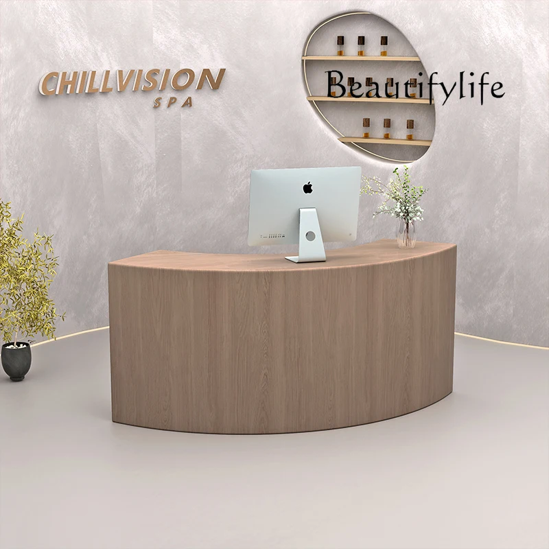 

Curved checkout page Beauty salon information desk Log color clothing store Curved front desk Reception desk