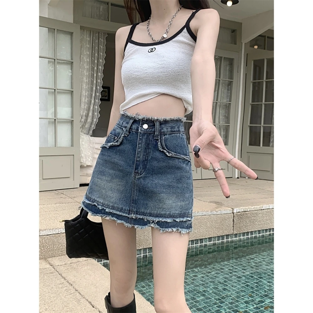 Amerikanische Retro-Denim-Shorts für Damen, sommerlicher, dünner Stil mit Fransen, sexy Hüftrock, A-Linien-Kurzhose mit weitem Bein