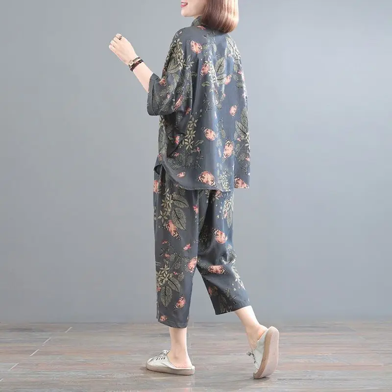 Trajes de moda de verano para mujer, cuello de POLO de manga corta con botones, jerséis con estampado Floral, pantalones hasta la pantorrilla con cordón