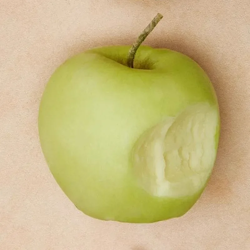 

Suddenly hand-painted bite of an apple scented candle