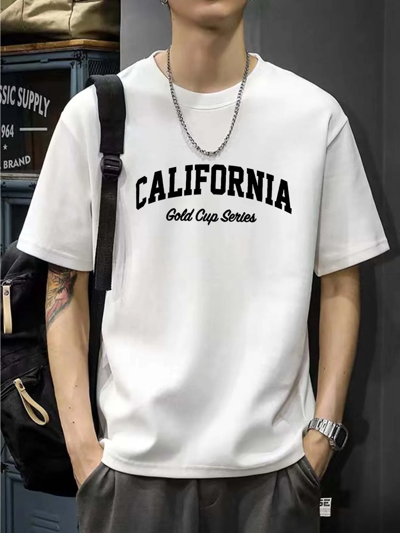 تي شيرت رجالي كاجوال فضفاض من القطن الخالص بنسبة 100% بنمط حروف كاليفورنيا مطبوع مريح برقبة دائرية وأكمام قصيرة