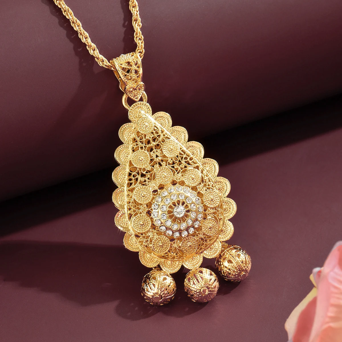 

Vintage Gold-Tone Necklace: Hollow Teardrop Filigree Pendant With Crystal Tassels. For Weddings, Parties & Elegant Outfits.