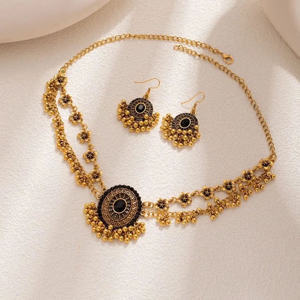 エスニックスタイル中空タッセルジュエリーセットラインストーン象嵌模造真珠ネックレスイヤリングセットウォータードロップペンダント