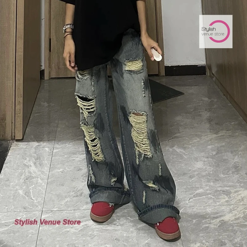 

American high street retro niche hole jeans women's summer new high waist loose slim Joker wide-leg pants mopping the floor.