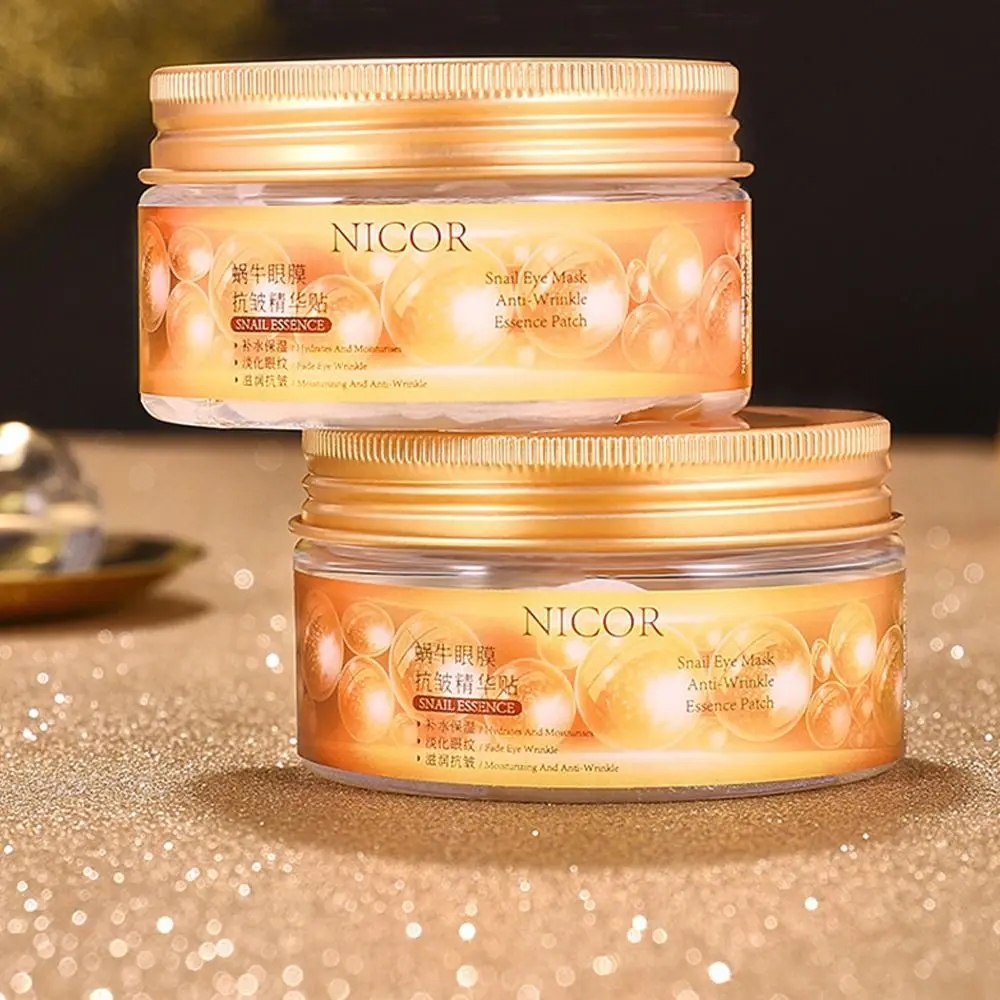 40 Uds nueva mascarilla hidratante para ojos de Caracol reafirmante Reduce las líneas finas parches para los ojos antiojeras máscaras para los ojos cuidado diario