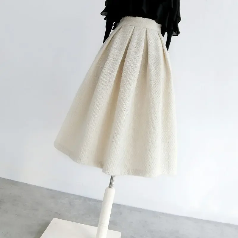 

2024 New Spring and Autumn Fashion Slim Jacquard Fluffy Skirt Temperament Commuter Women's Flesh Covering Unique Half Skirt L461