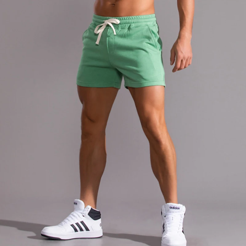 Pantalones cortos de algodón para correr para hombre, ropa interior deportiva informal para gimnasio, Fitness, entrenamiento de Yoga, Boxers sueltos, pantalones súper cortos para el sudor