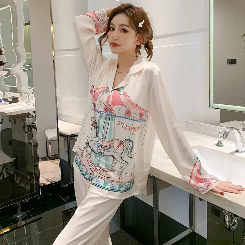 

Fashionable pajamas, women's ice silk spring new long sleeved pants set, cartoon dreamy spinning carriage home clothing