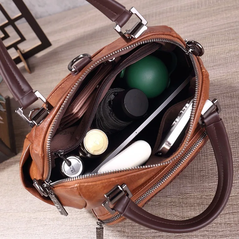 Johnature Vintage Handmade Embossed Backpack 2026 New Multi-purpose And Versatile Large Capacity Women's Bag