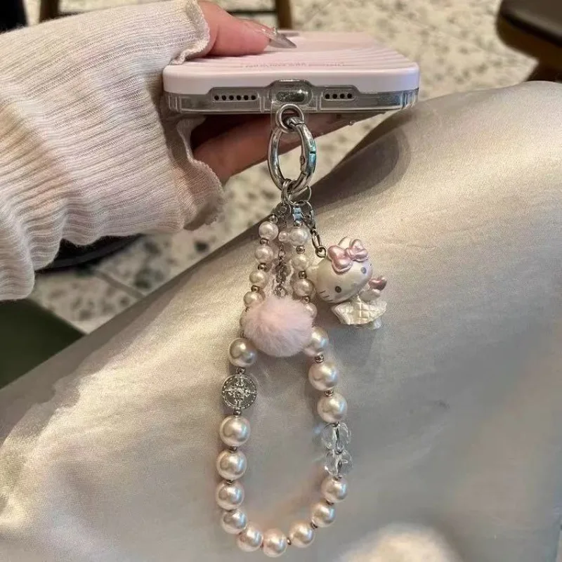 Nouvelle mode rose boule de cheveux KT chat perlé téléphone portable pendentif mode douce fille coeur perle papillon Bracelet