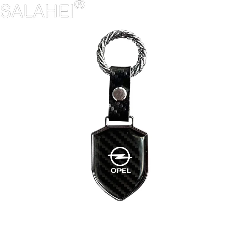 

Для Opel Astra Insignia Corsa Zafira Antara Meriva Mokka Vivaro Vectra автомобильный щит из углеродного волокна брелок в подарок кулон брелоки