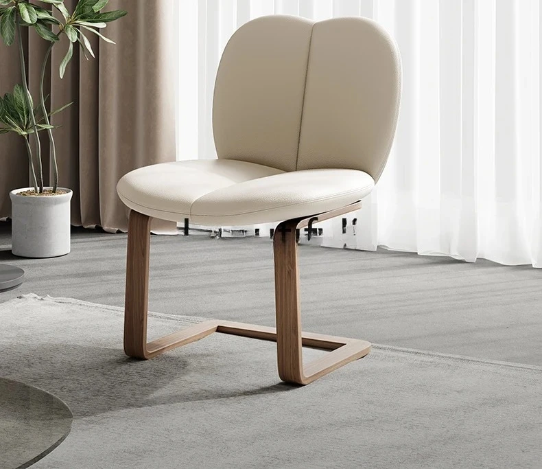 A  Modern Nordic style first layer cowhide living room sand curved wood four-leaf clover dining chair