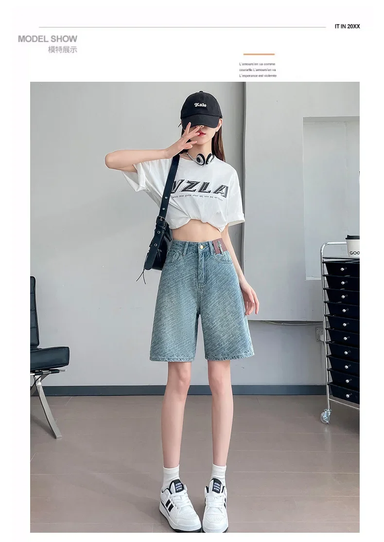 Gewassen blauwe denim shorts met hoge taille, dames nieuwe zomermode dunne losse denim wijde pijpen casual halflange broek