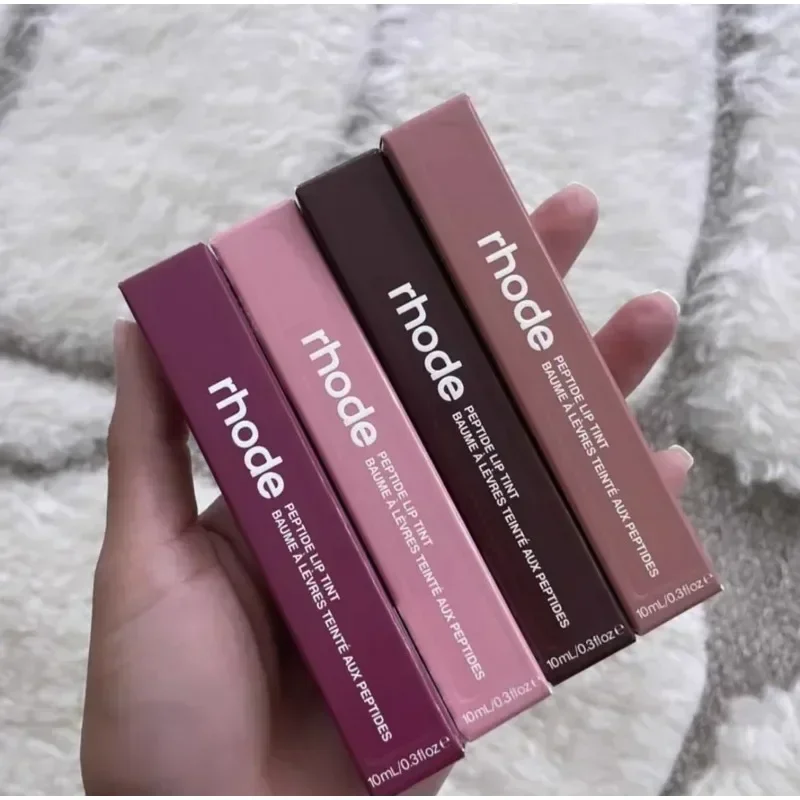 Rhode Lip Gloss ลิปกลอส Plump Moisturizing Lip Glaze Essence Gel น้ํามันลิปสติก Mirror Glass แต่งหน้าติดทนนานสาว